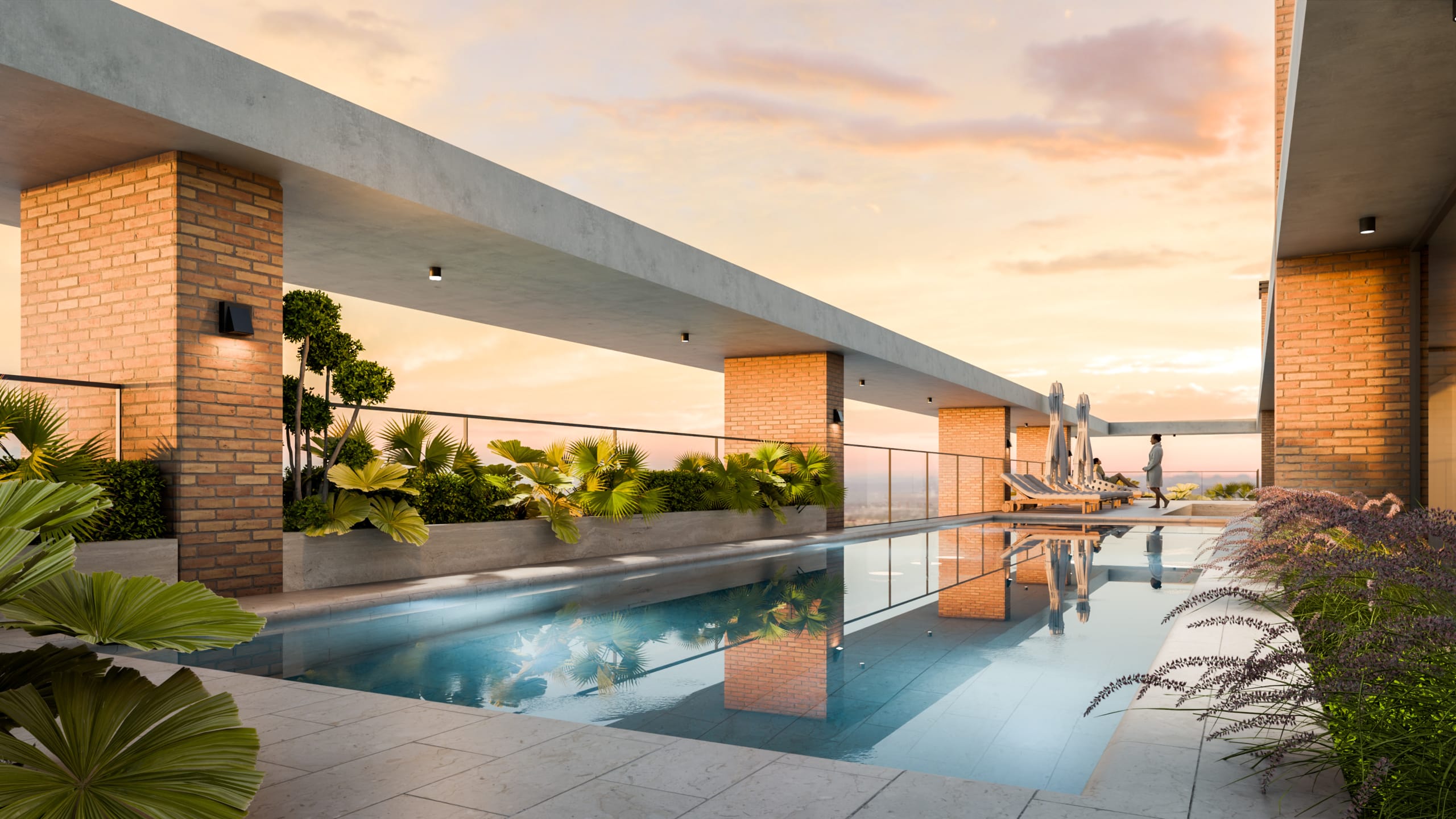 Piscine rooftop avec transats et végétation tropicale dans la résidence Narciso La Cuadrita à Asunción au Paraguay.
