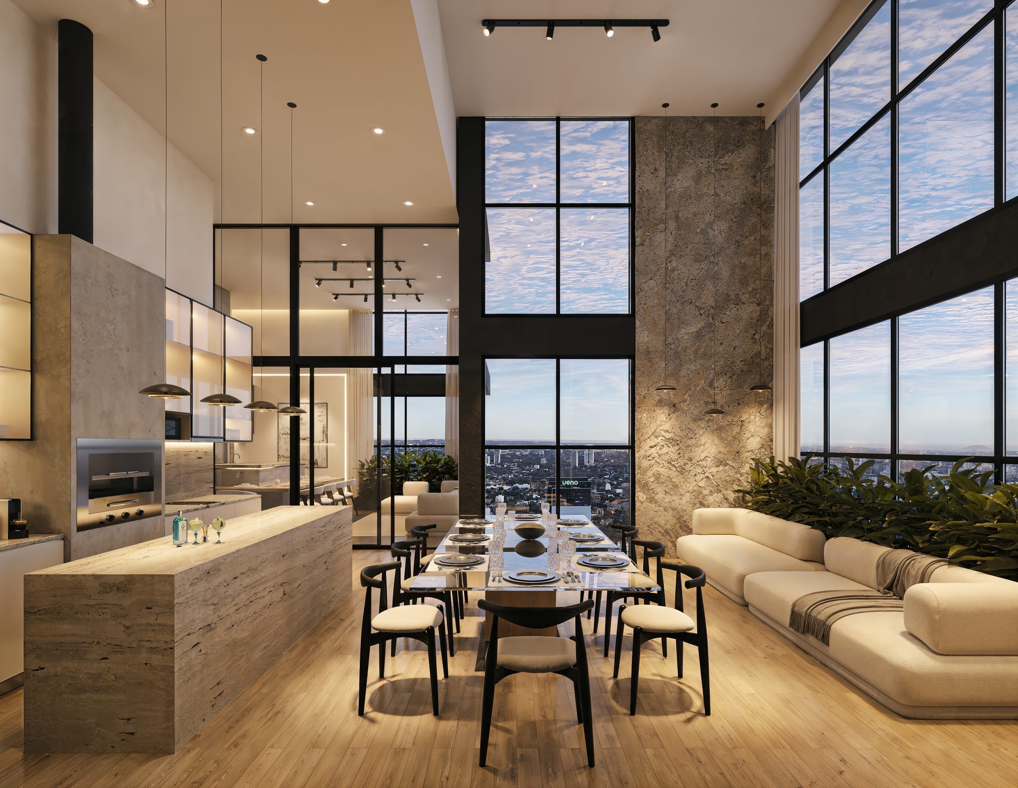Quincho en double hauteur avec cuisine, grande table et salon dans la résidence Aether by Civis à Asunción, Paraguay.