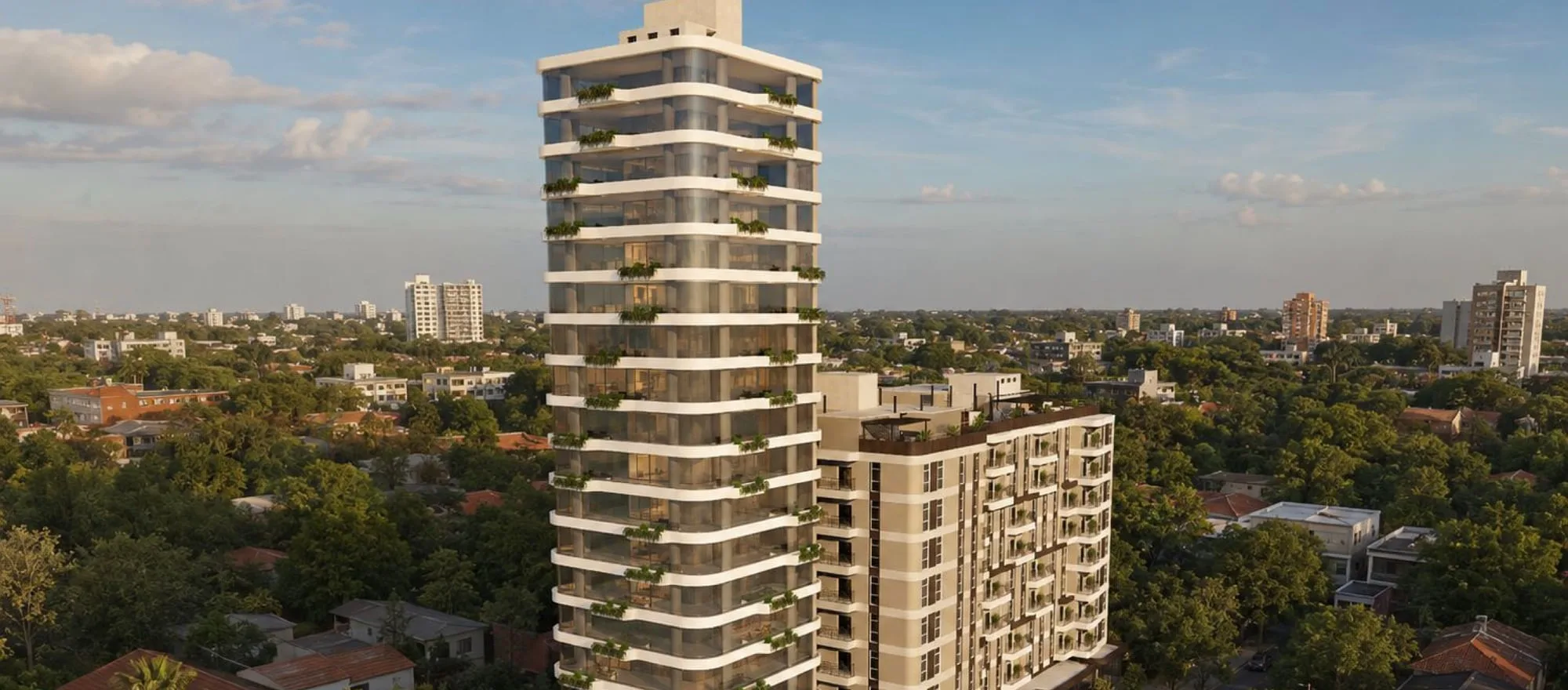 Vue aérienne de l’ensemble Invicta Mariscal à Recoleta, Asunción, Paraguay : immeuble résidentiel et tour de bureaux.