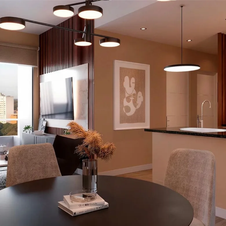 Rendu d’Invicta Villa Morra à Asunción, Paraguay : séjour et cuisine d’un appartement 2 chambres.