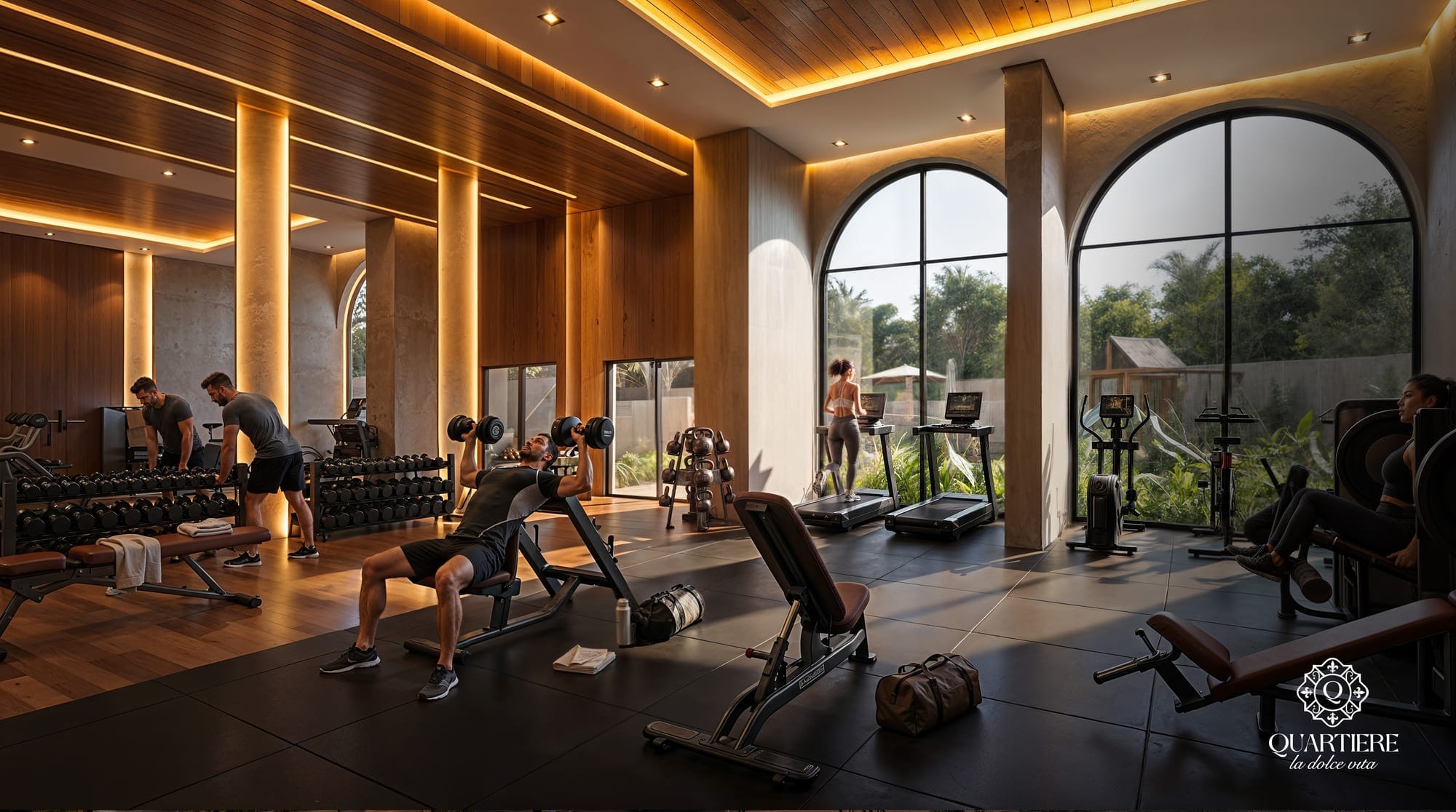 Salle de sport équipée ouvrant sur le jardin par des baies en arc dans la résidence Quartiere à Asunción, Paraguay.