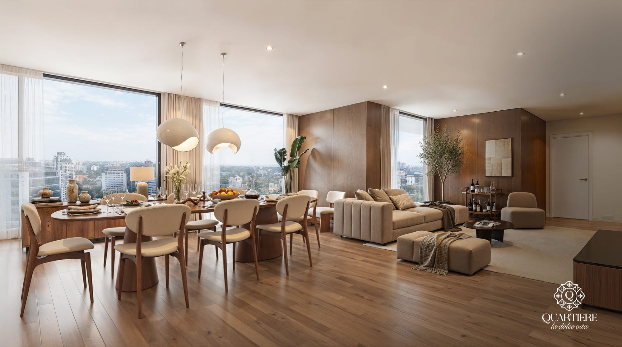 Grand séjour et salle à manger du penthouse, avec vue sur la ville, dans la tour Quartiere à Asunción, Paraguay.