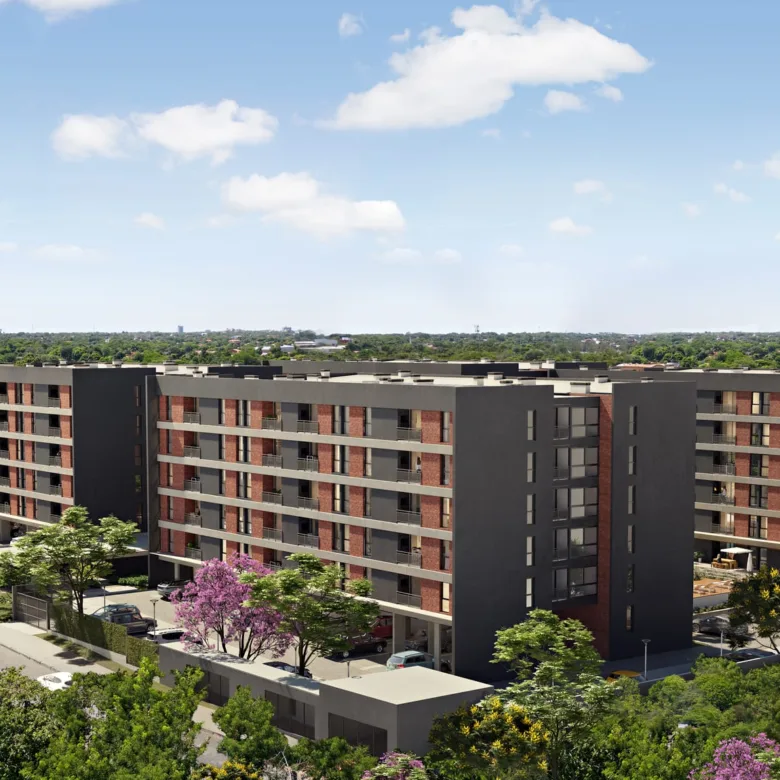 Façade des immeubles Urban Cumbres vue depuis la rue, à Luque, Paraguay.