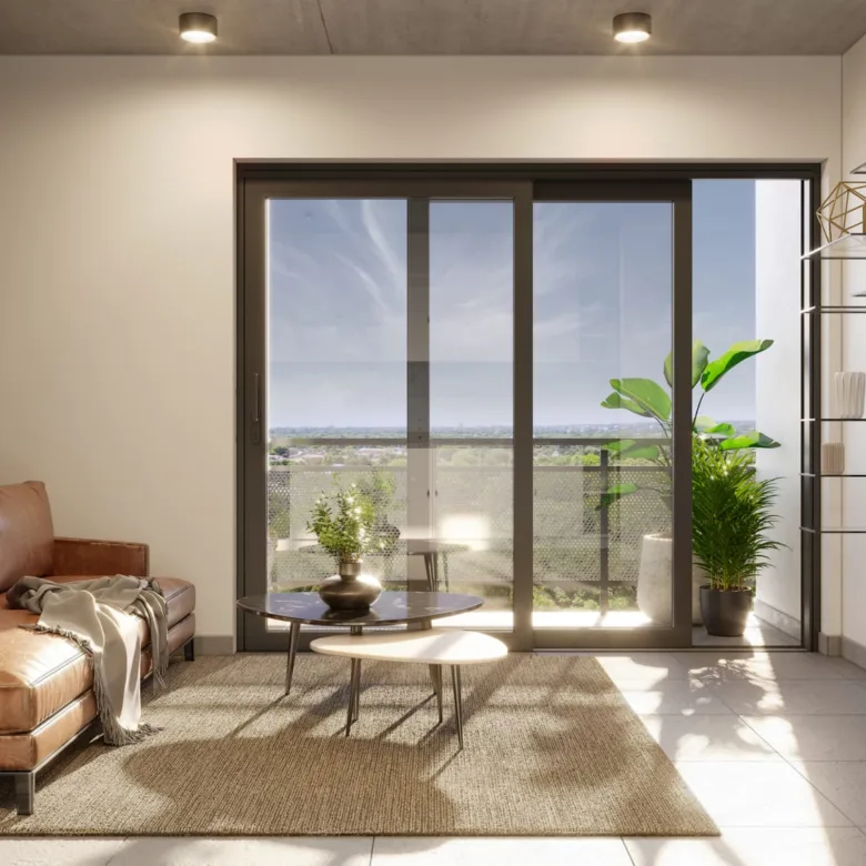 Séjour ouvert sur le balcon d’un appartement d’Urban Cumbres, à Luque, Paraguay.
